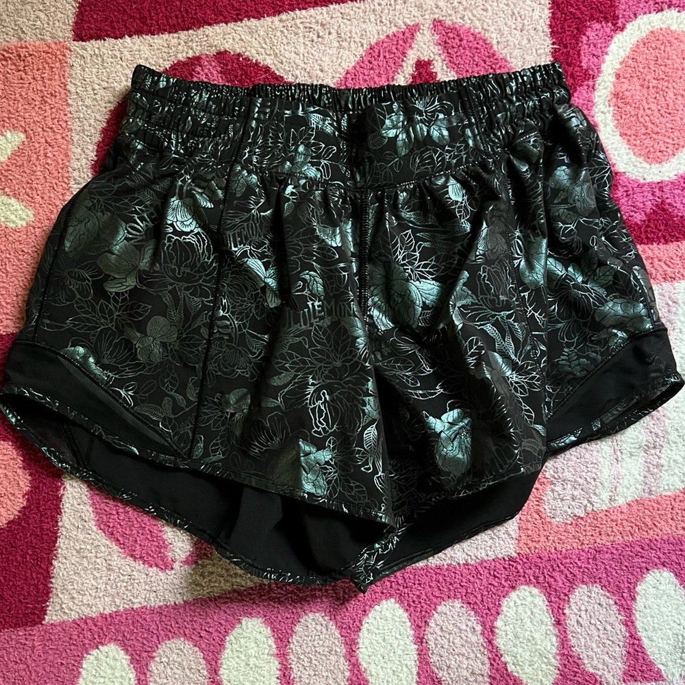 Floral lululemon hotty hot shorts black and green metallic
